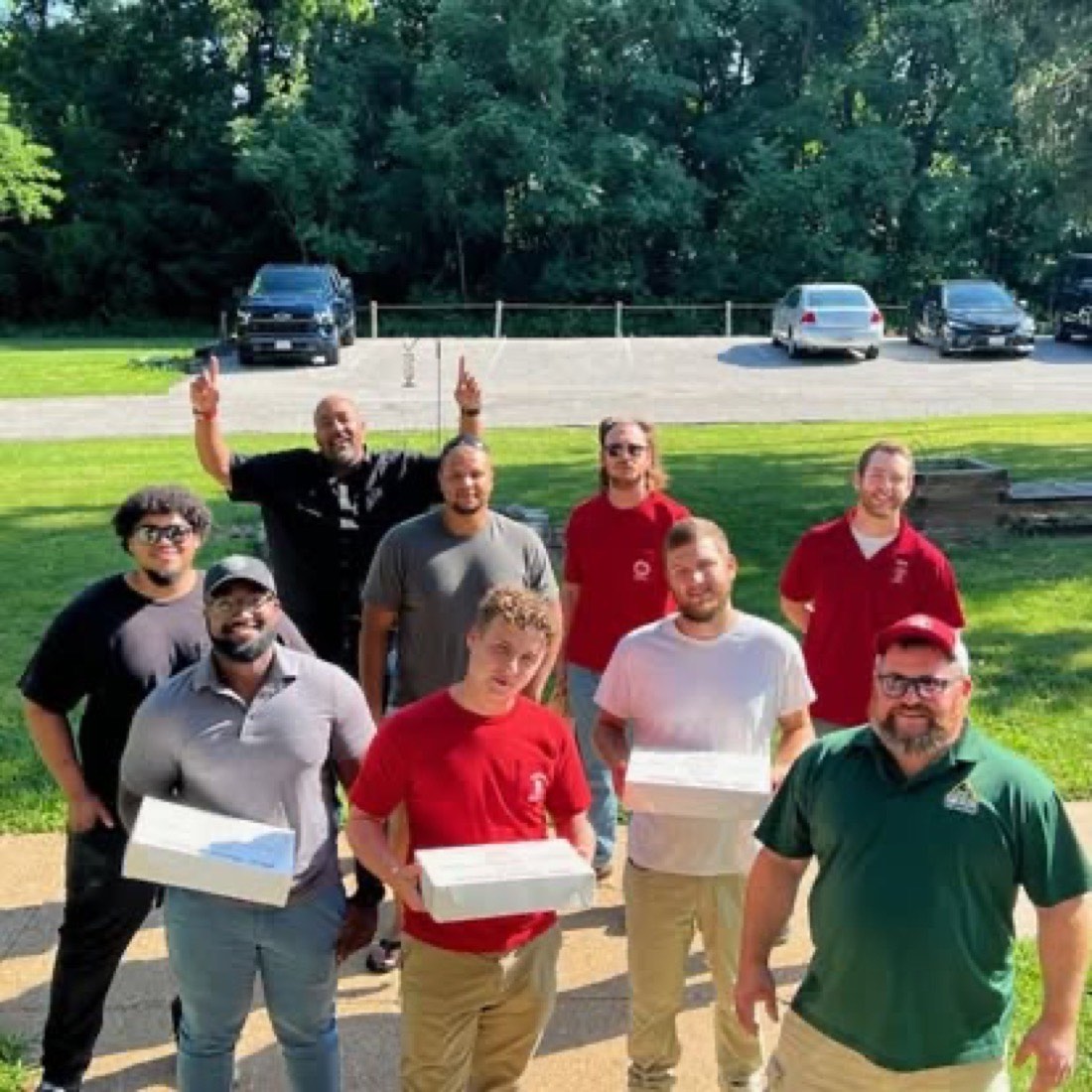 Members delivering boxes of donations
